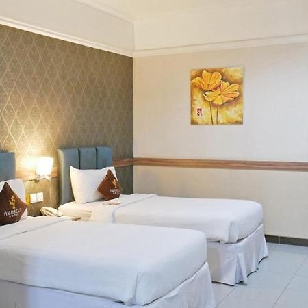 Amarelo Hotel Solo Esterno foto