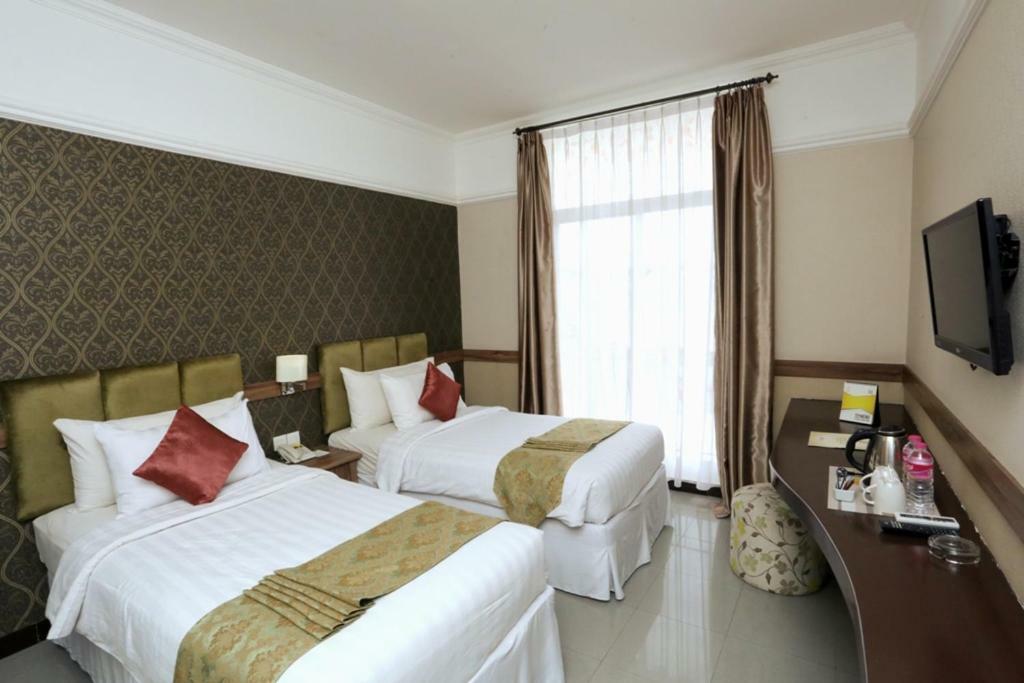 Amarelo Hotel Solo Esterno foto