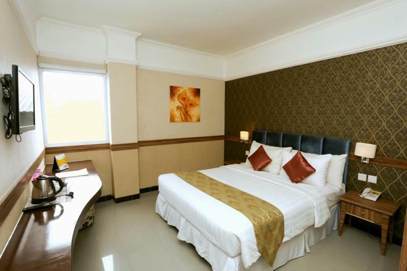 Amarelo Hotel Solo Esterno foto