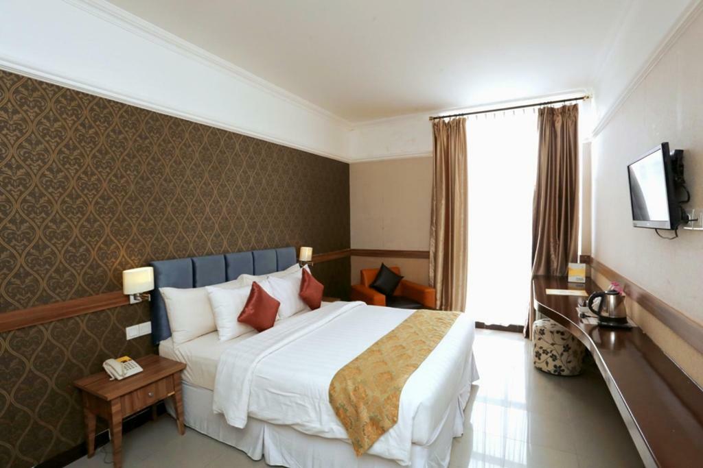Amarelo Hotel Solo Esterno foto