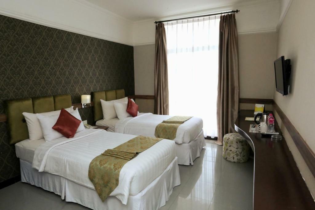 Amarelo Hotel Solo Esterno foto
